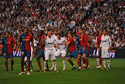 A 2009 Spanish La Liga match between Real Madrid and Barcelona. The fixture, known as El Clásico, is one of the most renowned in sport.[175]