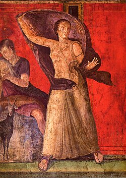 Female figure, veiled and seemingly alarmed, from a wall-painting usually described as a narrative from Dionysiac/Bacchic mystery cult, which might also involve Ariadne and a marriage. There is "almost no agreement about how it works in detail". From Pompeii's "Villa of the Mysteries"[95]