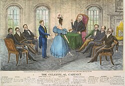 Jackson faces a woman dancing, flanked by three seated men on right; three seated men on left and one man standing behind the woman