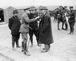 General Sir Douglas Haig (second left) in discussion with Lloyd George in September 1916.