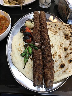 Traditional Iraqi Kebab, made out of ground lamb and known for its oily texture