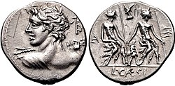Denarius of Lucius Caesius, 112–111 BC. On the obverse is Apollo, as written on the monogram behind his head, who also wears the attributes of Vejovis, an obscure deity. The obverse depicts a group of statues representing the Lares Praestites, which was described by Ovid.[296][297]
