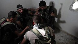 FSA fighters plan during the Battle of Aleppo (October 2012).
