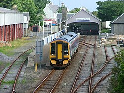 A Class 158 leaving Thurso with a service to Inverness