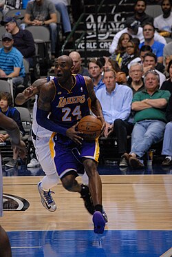 Bryant driving against the Dallas Mavericks on February 24, 2013. Bryant tallied 38 points in a performance that would be later dubbed "the amnesty game"