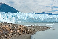 Tourists trekking by the Perito Moreno Glacier, near El Calafate