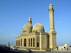 The Bibi-Heybat Mosque in Baku. The mosque is built over the tomb of a descendant of Muhammad.[282]