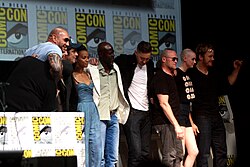 The cast and crew of Guardians of the Galaxy at the 2013 San Diego Comic-Con (L-R: producer Kevin Feige, Bautista, director James Gunn, del Toro, Saldaña, Hounsou, Pace, Rooker, Gillan, and Pratt)