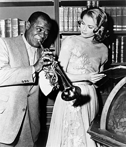 Armstrong entertains Grace Kelly on the set of High Society, 1956