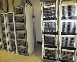 Older stand-alone ADSL filter and splitter banks at a telephone exchange