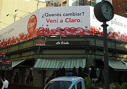 Voseo used on a billboard in Buenos Aires, Argentina: ¿Querés cambiar? Vení a Claro ("Do you want to change? Come to Claro."). In tuteo, it would have been ¿Quieres cambiar? Ven a Claro.