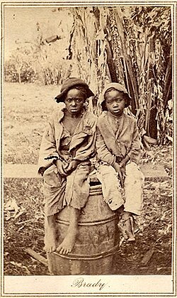 A photograph of two children who likely were recently emancipated – circa 1870