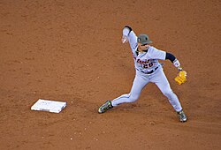 Javier Báez making a baseball play