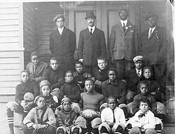 The 1908 champion YMCA team on the steps of the Witherspoon Street School