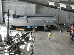 Artillery and a Higgins boat on display in the lobby