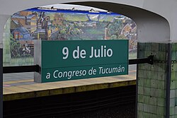 A mural undergoing restoration at 9 de Julio station.