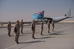 An honor guard from No. 37 Squadron with a C-130J Hercules, November 2009