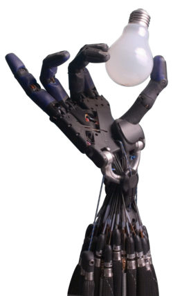 An artificial hand holding a lightbulb