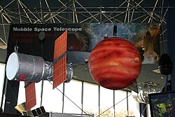 A scale model of the Hubble Space Telescope on display in the visitor center
