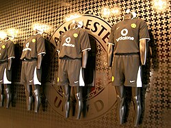Manchester United replica away strips on display