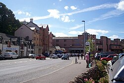 Cars passing through Millburn Road