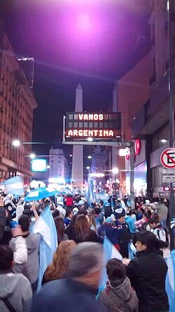 Argentine fans cheering near the Obelisco after the men's national team qualified to the 2014 FIFA World Cup final.