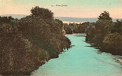 Coloured postcard of the Jordan River, by Karimeh Abbud, c. 1925