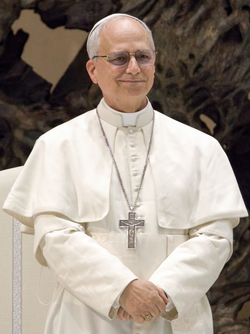 The pope (currently Leo XIV) is concurrently the sovereign of the Vatican City State, by virtue of his position as head of the Catholic Church.