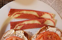 Two slices of vegetarian bacon