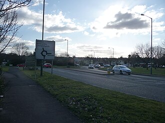 Northbourne Roundabout; at the boundary of Bournemouth (see the welcome sign on the left). The A347 road crosses this roundabout southbound. The road to the right of the roundabout is Wimborne Road, and is the eastern end of the A341 road.