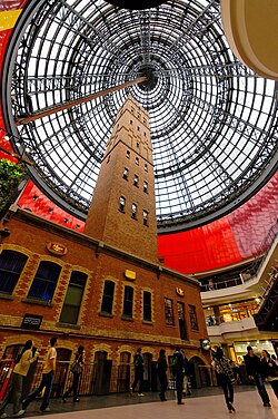 The 19th-century Coop's Shot Tower enclosed in Melbourne Central, one of the city's major retail hubs