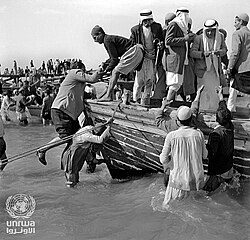 Palestine refugees leave the Gaza Strip on fishing boats in the wake of the war in 1948