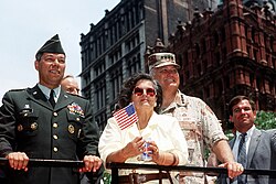 Gen. Colin Powell, Gen. Norman Schwarzkopf, and Mrs. Schwarzkopf ride in the Welcome Home parade in New York City honoring the men and women who served in Desert Storm