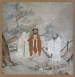 A Chinese painting showing a scene of the Buddha, Laozi, and Confucius standing together and smiling by a bridge and a tree