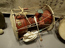 An ornamented drum
