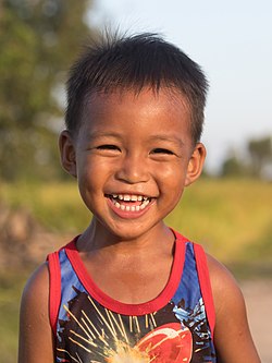 A child in Laos laughing