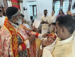 Baptism in a Syriac Orthodox church in India
