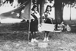 Girl Scouts with handmade TTPI flag