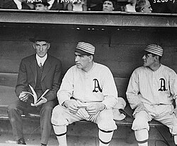 Hall of Fame manager Connie Mack with the Philadelphia Athletics (left) wearing a suit instead of a team uniform