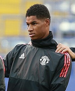 Rashford warming up for Manchester United in 2017