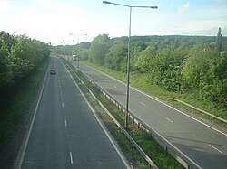 A typical British dual carriageway with central barrier on the A63 near Hull, England