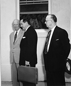 Faubus with President Dwight D. Eisenhower and Arkansas Congressman Brooks Hays after a meeting on the Little Rock school crisis at the Newport Naval Base, September 14, 1957.