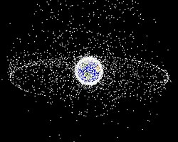 A computer-generated image mapping the prevalence of artificial satellites and space debris around Earth in geosynchronous and low Earth orbit