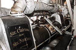 One of the two tandem-compound steam engines on the Steamboat Natchez. Each engine produces 1600 horsepower and has the dimensions 7 feet (2.1 m) by 30 inches (0.76 m) by 15 inches (0.38 m).