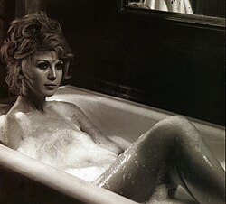 Actress Erna Schürer in a bathtub