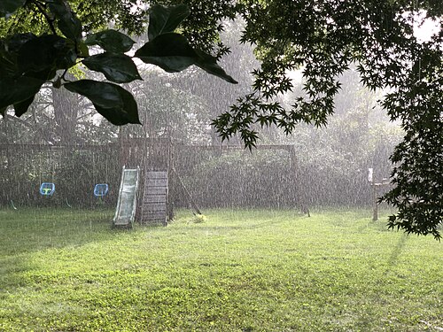A sunshower over a backyard in Ewing Township, New Jersey