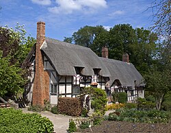 Anne Hathaway's Cottage in Warwickshire, England: Its timber framing is typical of vernacular Tudor architecture.