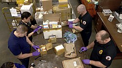 The Food and Drug Administration inspects packages for illegal drug shipments.