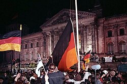 Flag of unified Germany raised at midnight of 3 October 1990 in front of the Reichstag building