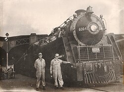 CN coal fired steam engine 6064 with engineer Carl Bruner (right) and colleague